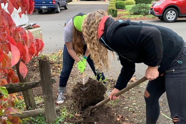 Westside Christian Students helping neighbors with yard work
